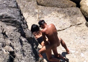 couples caught on beach